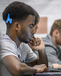 student looking at computer