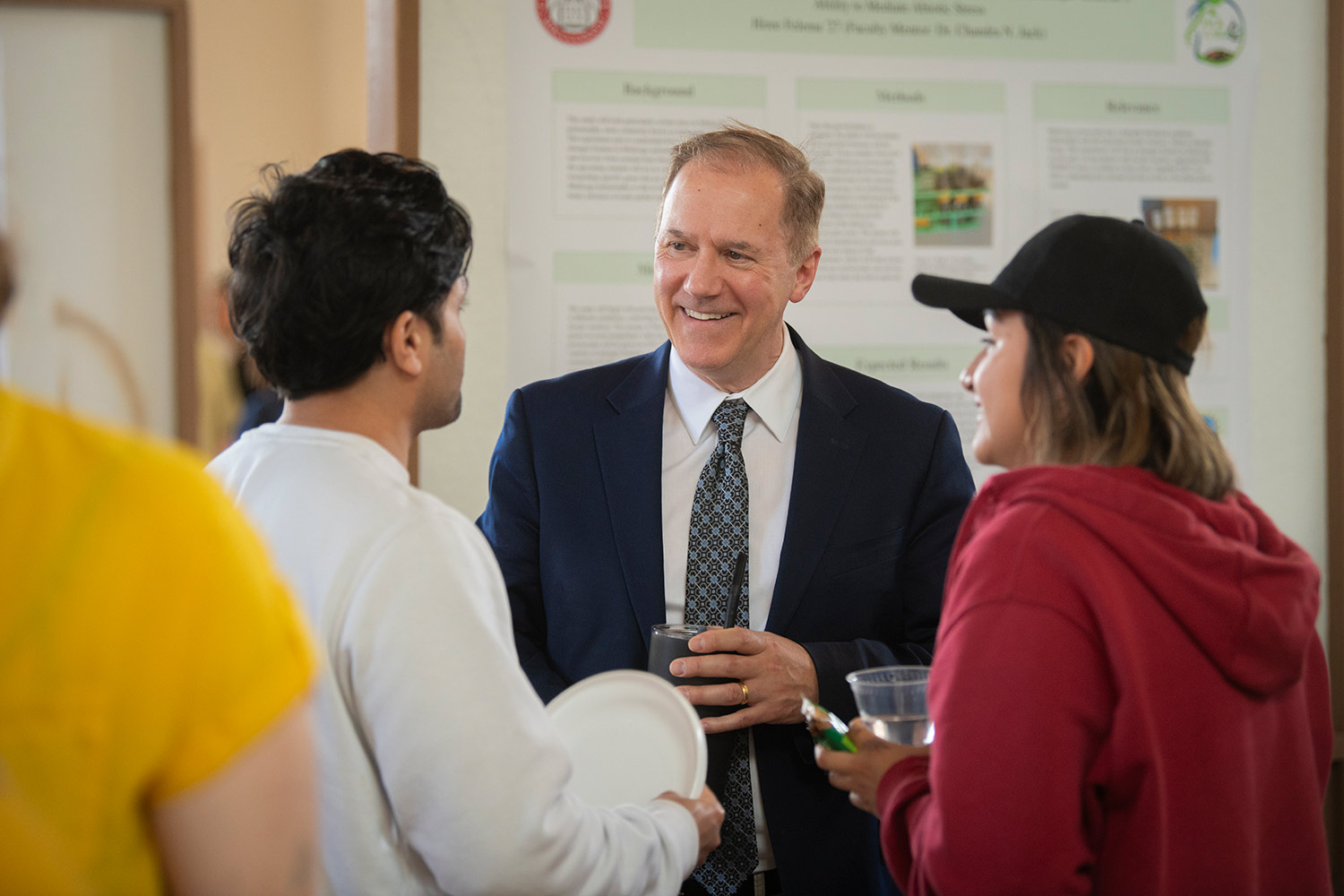 President David Fithian speaks with students at ClarkFest.
