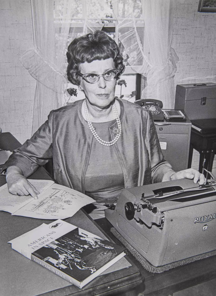 Esther Goddard at her typewriter