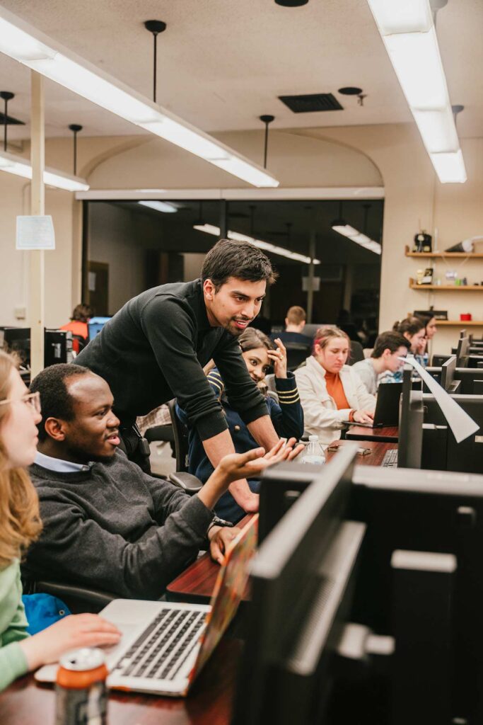 Students participate in a map-a-thon event at the Clark Graduate School of Geography