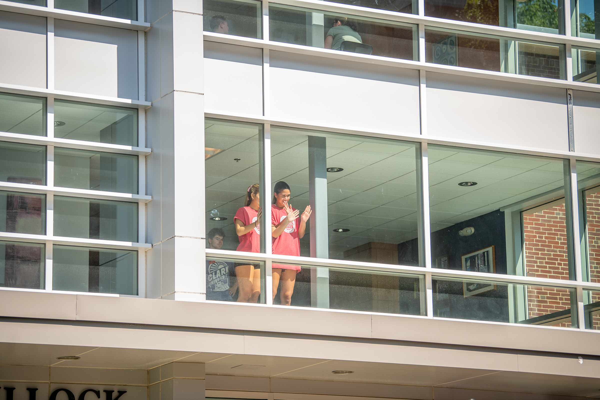 Wright Residence Hall - girls waving in the window