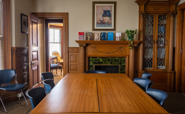 Anderson House - fireplace with table