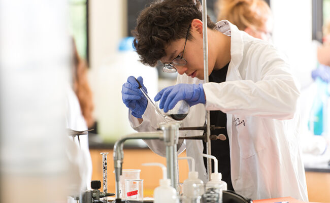 Arthur M. Sackler Sciences Center - young man with lap equipment