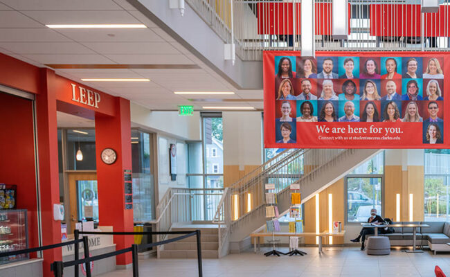 Shaich Family Alumni and Student Engagement Center (ASEC) banner hanging in large hallway