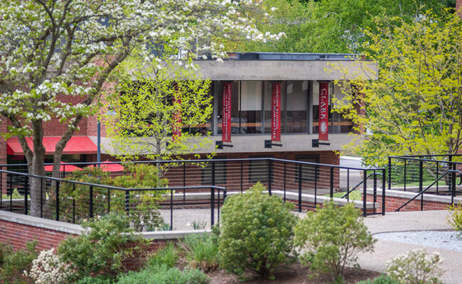 Dana Hall outside table area with umbrellas