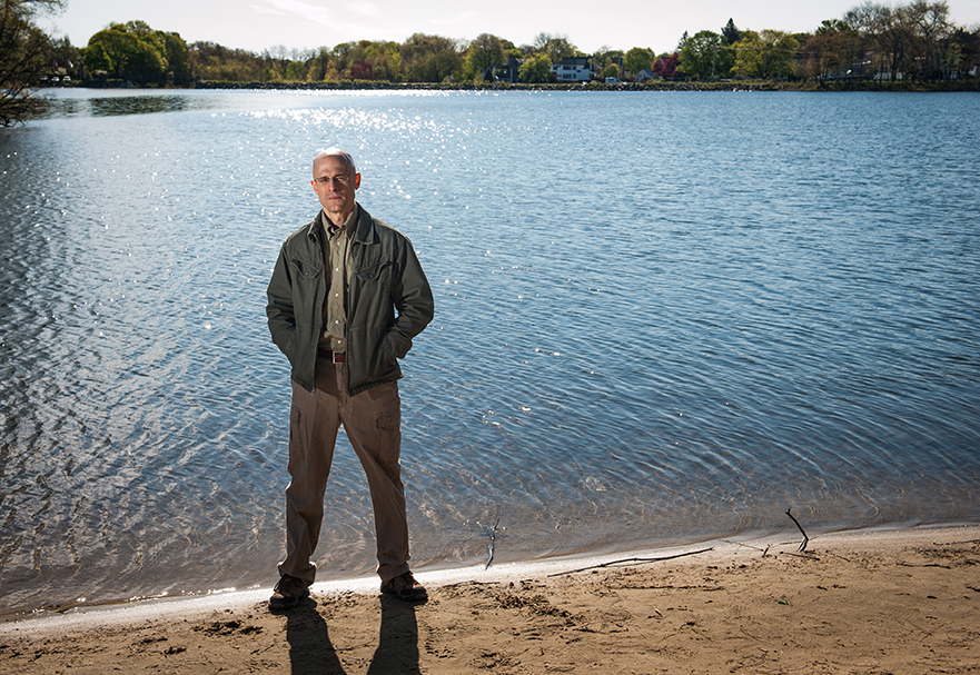 Rob Johnston on pond beach front