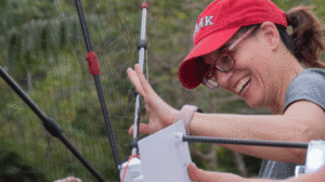 Florencia Sangermano hooking up equipment in Brazil