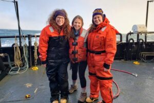 Christina Goethel of UMCES, Clare Gaffey of Clark University, and volunteer Ruth Cooper aboard the Norseman II ship