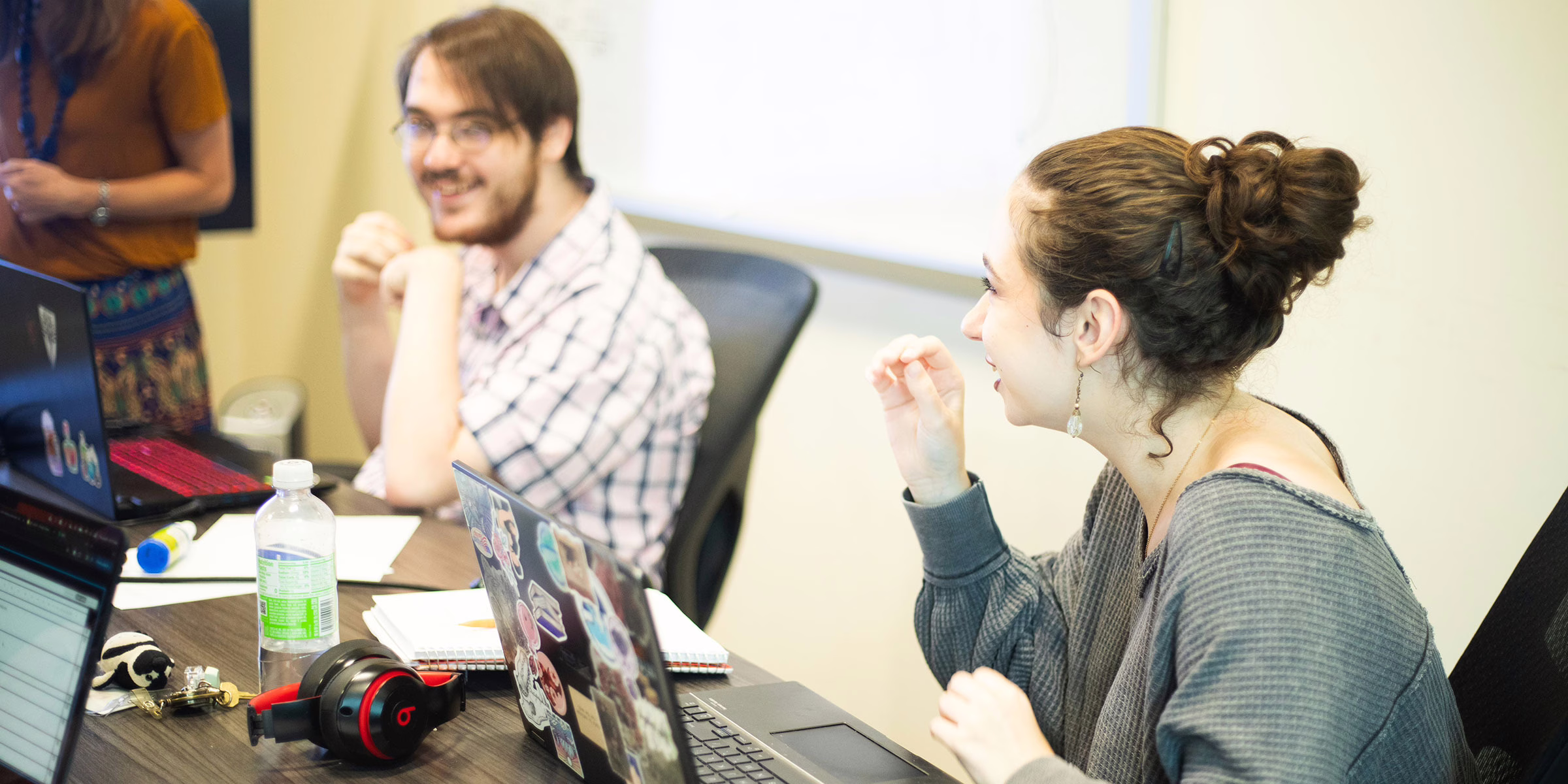 Students conversing in Jacqueline Dresch's lab