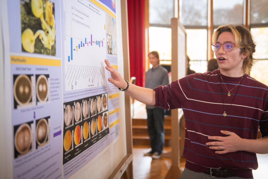 Student presenting poster at ClarkFEST 2025