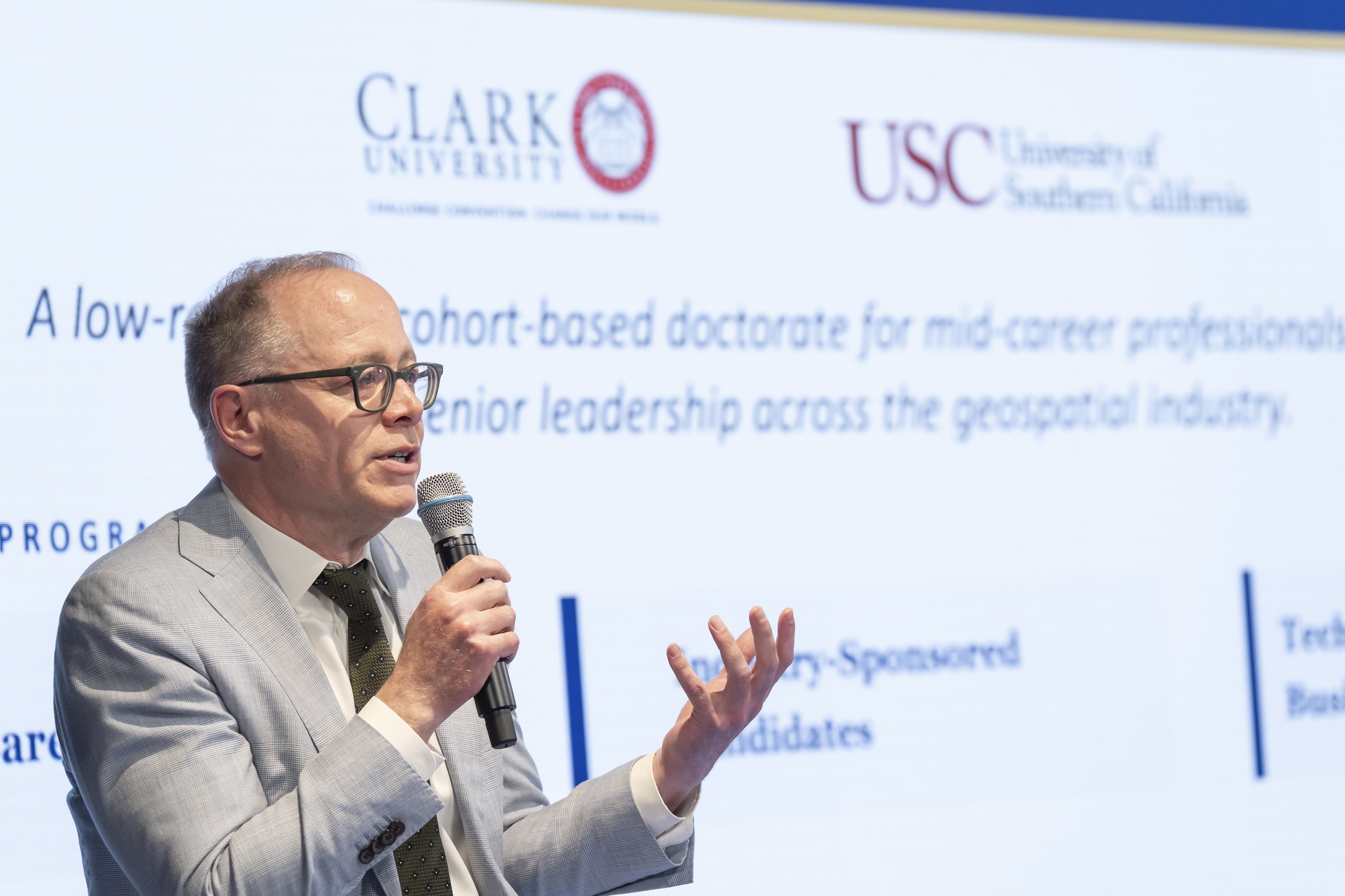 Lou Leonard, D.J.A. Spencer Dean of the School of Climate, Environment, and Society, speaks at the London launch of Clark’s new Executive Doctor of Geospatial Leadership (DGEO) program.