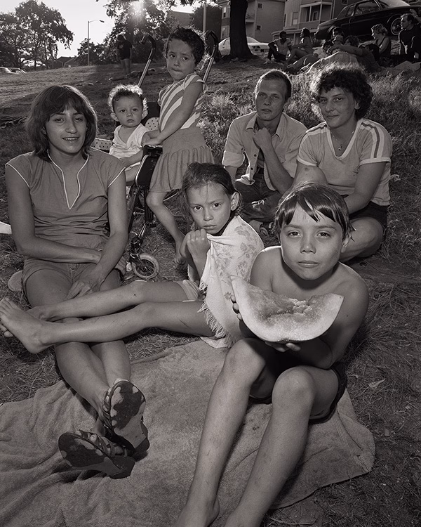 A family sits at Bell Pond, 1983