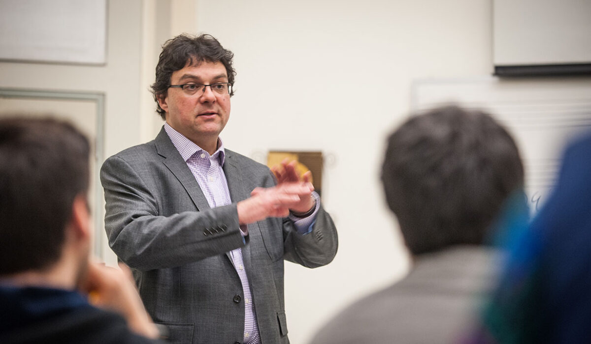 Music Professor Benjamin Korstvedt talks to an audience