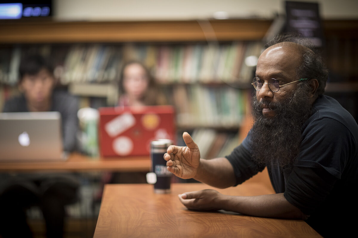 Jude Fernando speaking in class
