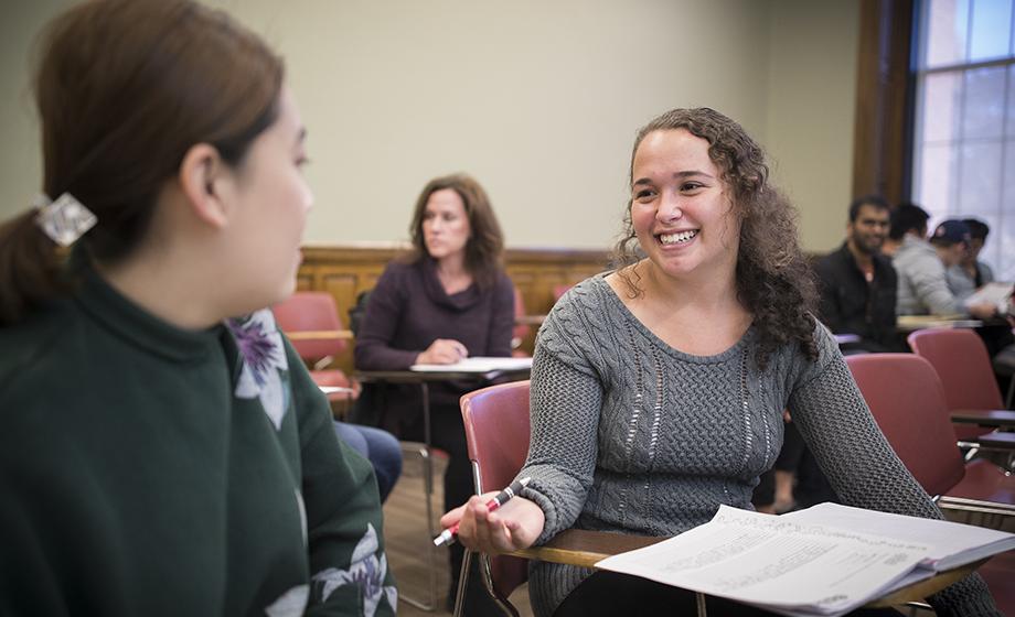 graduate students talking in class