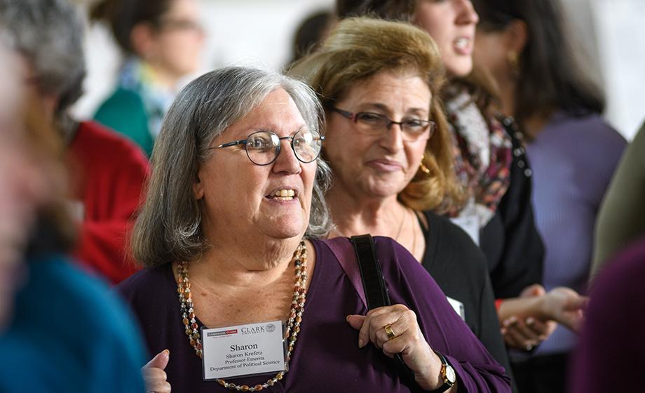 woman sitting in audience