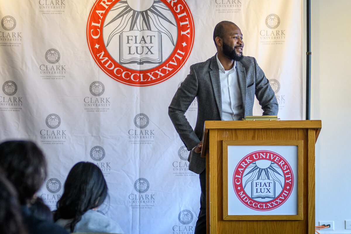 Clark staff member standing at podium