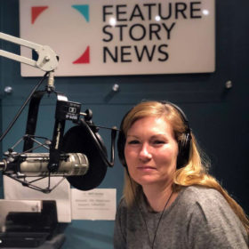 Karen Frey at the microphone in On Point studios