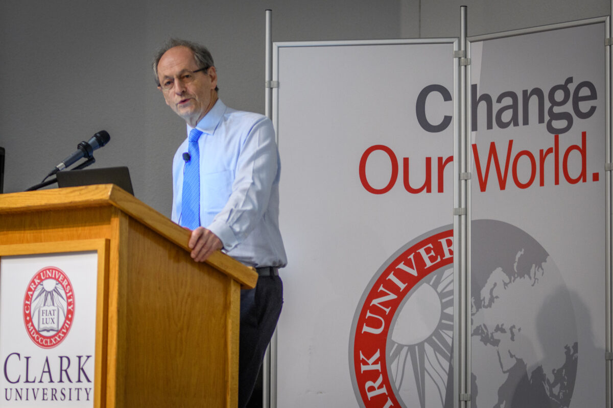 Sir Michael Marmot standing at podium