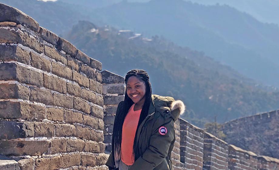 Tiana Golding standing on the great china wall