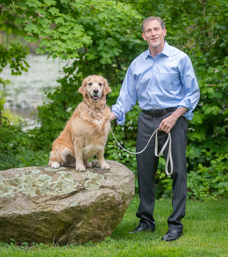 Jeremy Cohen and his golden retriever, Maisie