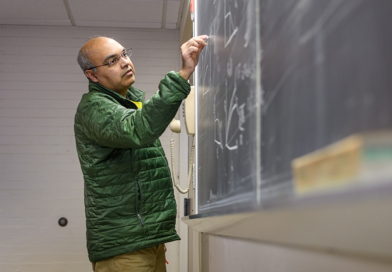 Arshad Kurdrolli at chalkboard