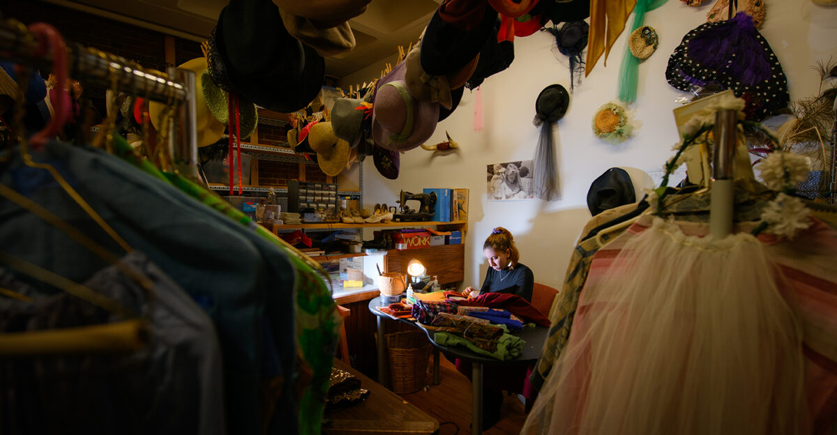 Julie Reed in the Clark University costume shop