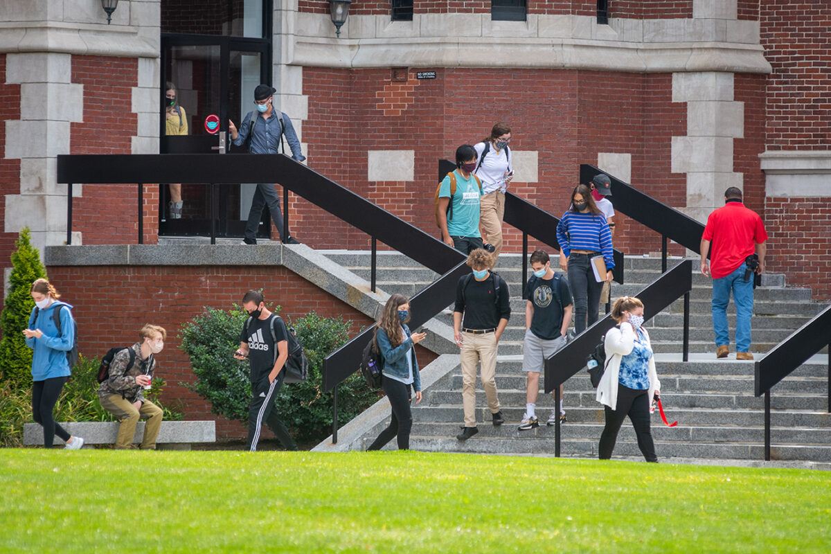 Students wearing masks walking out of the Jefferson Academic Center