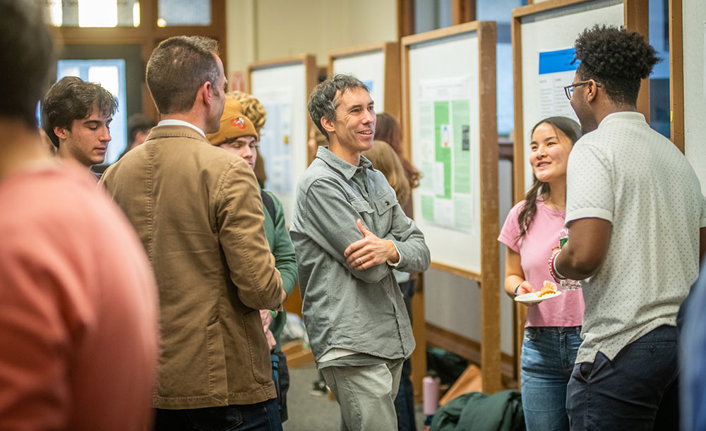 People attending poster event