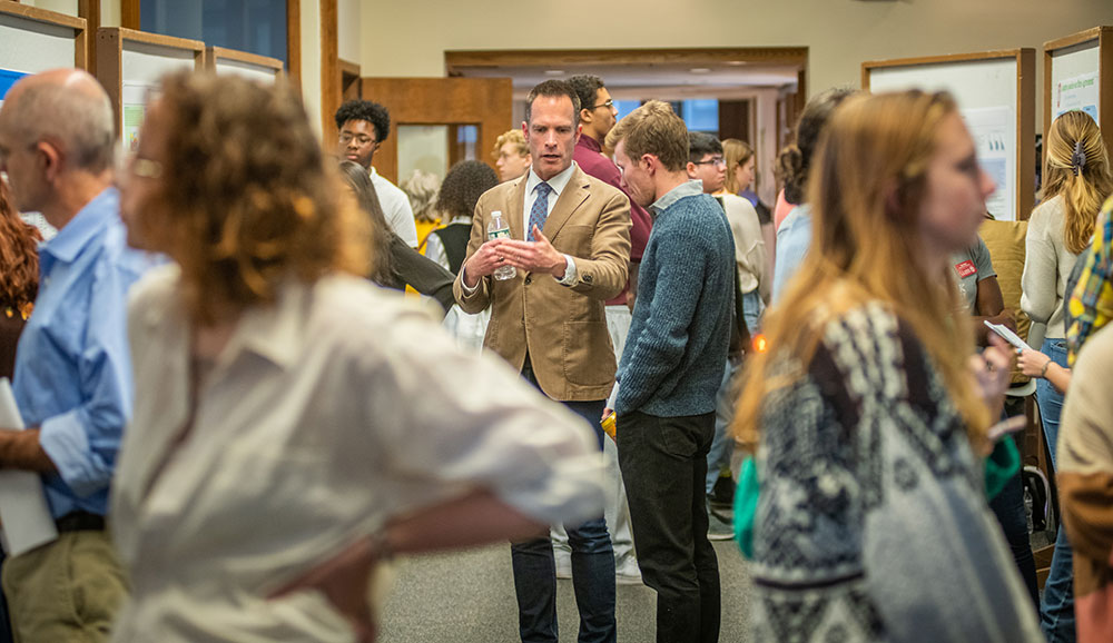 People attending poster event