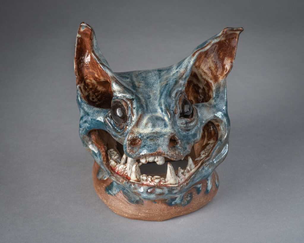 A clay gargoyle head made by Brynn Keevil '23