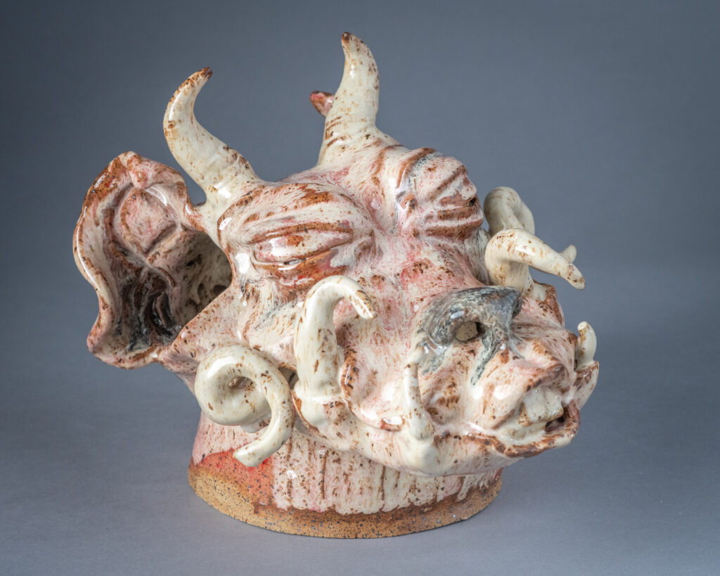 A clay gargoyle head made by Brynn Keevil '23