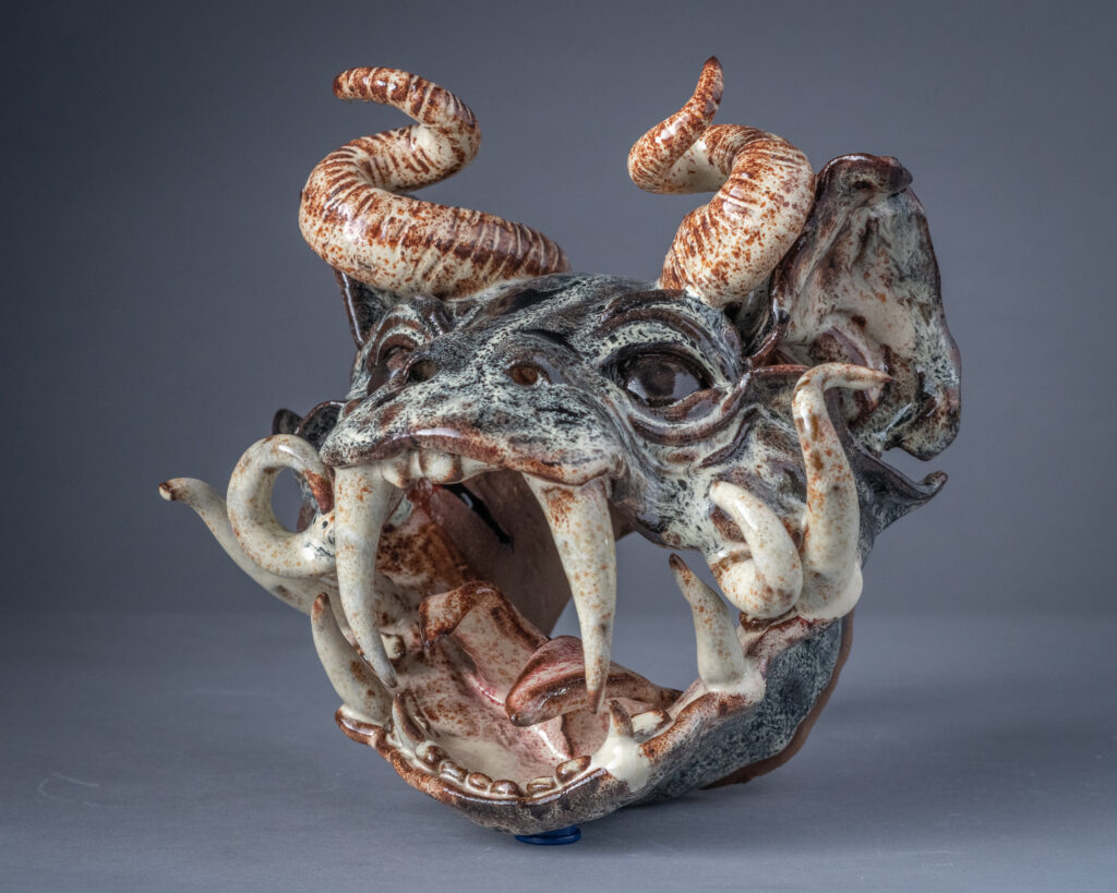 A clay gargoyle head made by Brynn Keevil '23