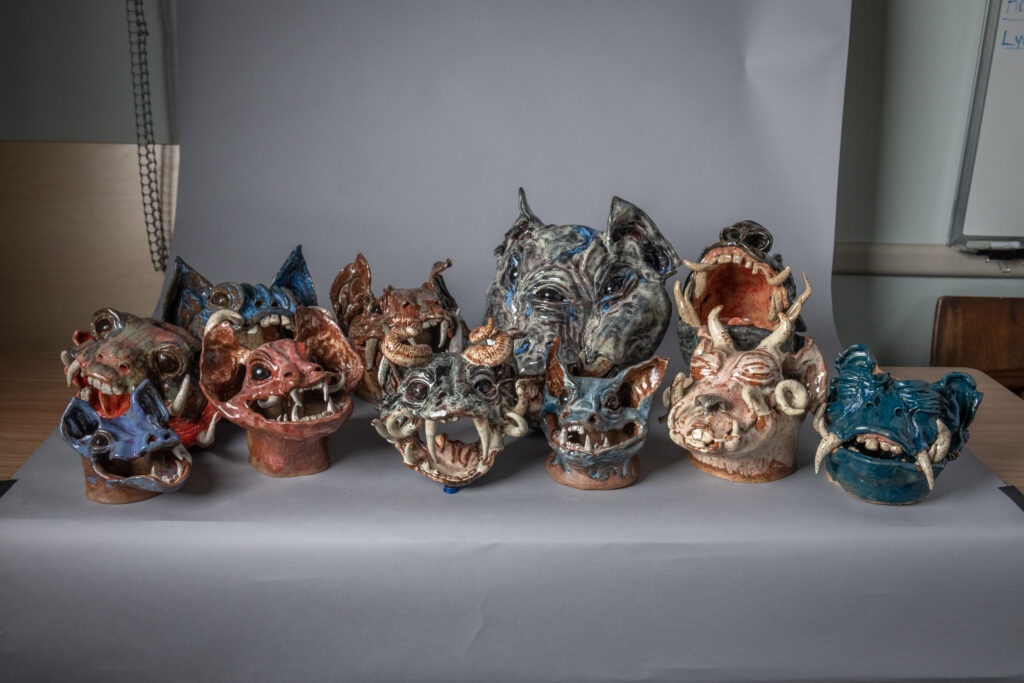 A clay gargoyle head made by Brynn Keevil '23