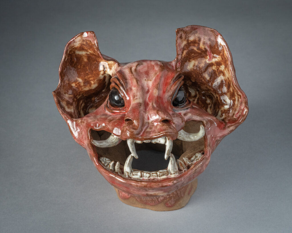 A clay gargoyle head made by Brynn Keevil '23