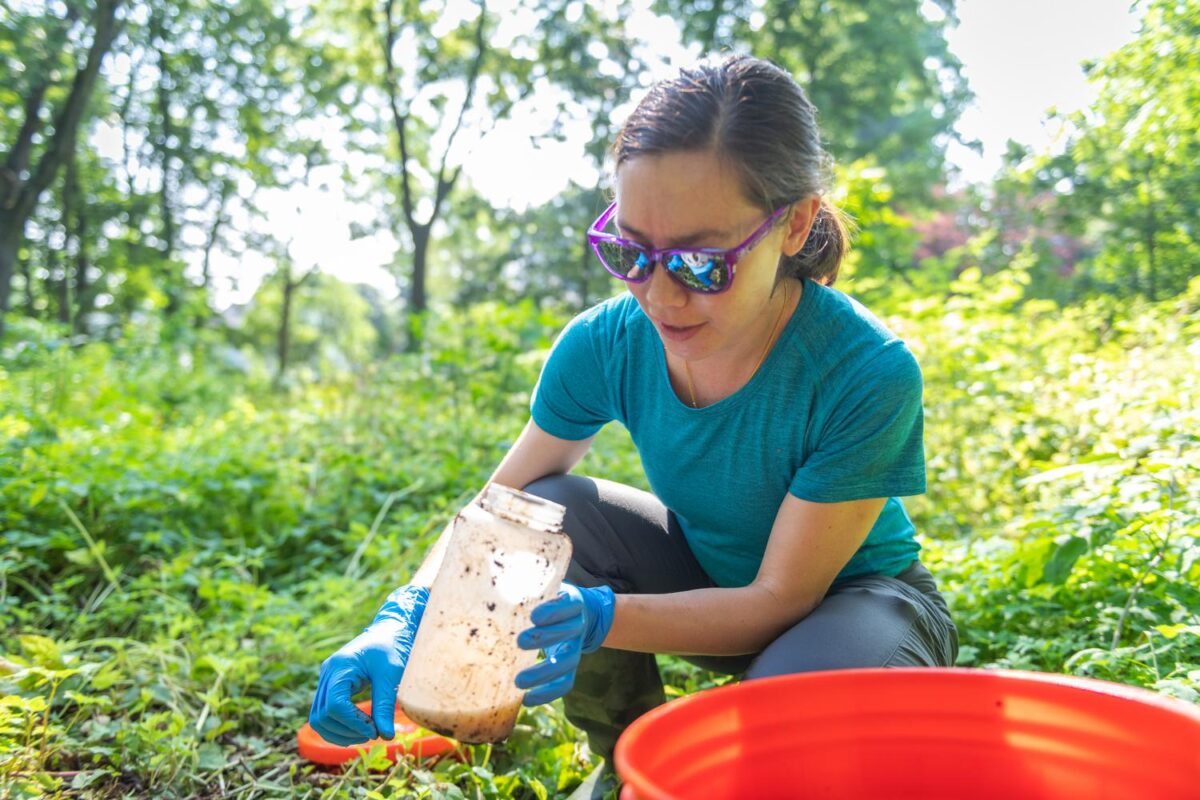 professor in woods with nalgene bottle