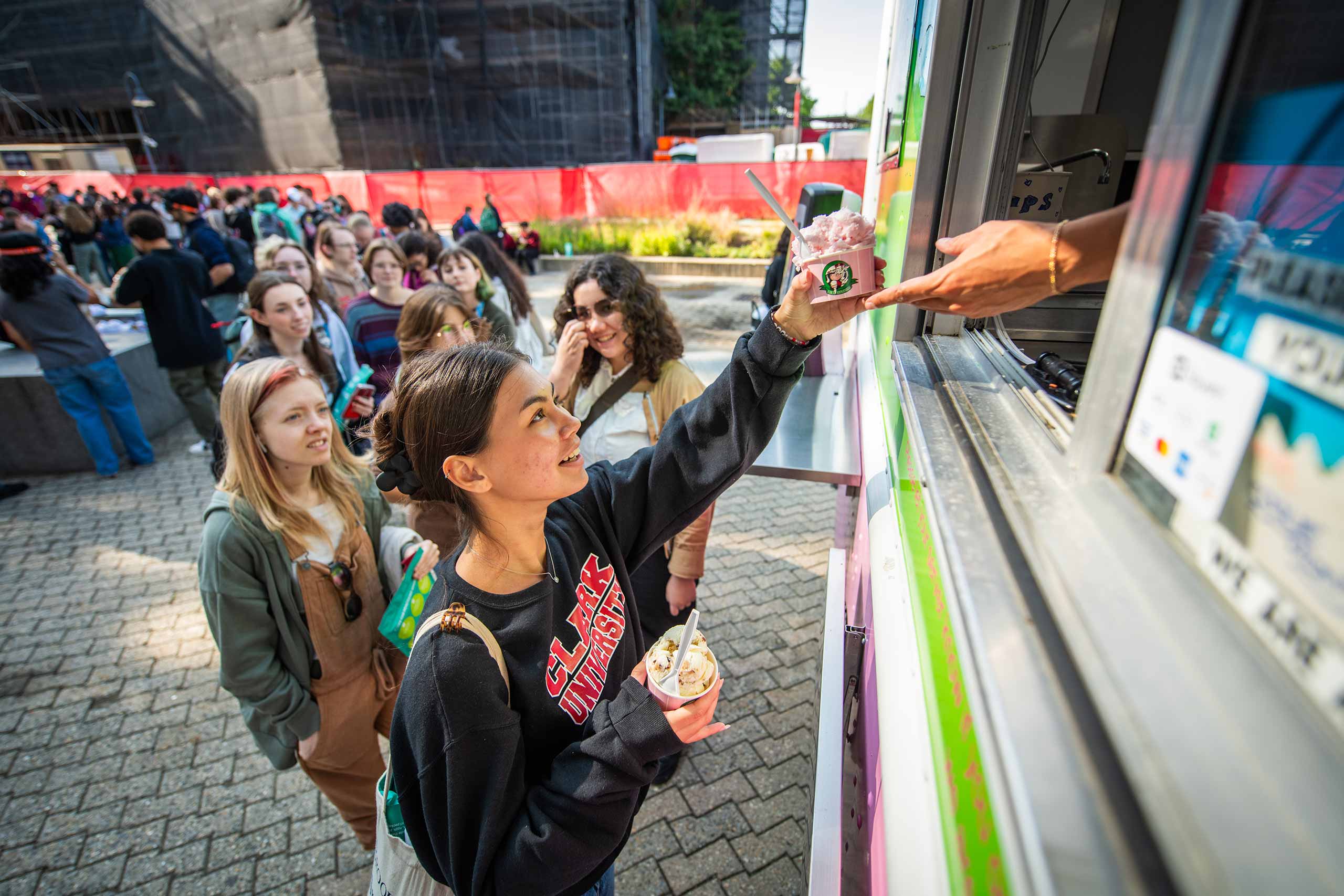 A student received a frozen treat during #FreshCheckDay, Clark University
