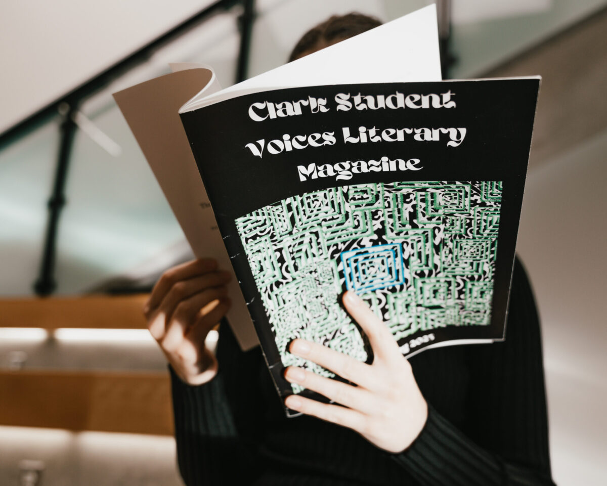 Student holding magazine