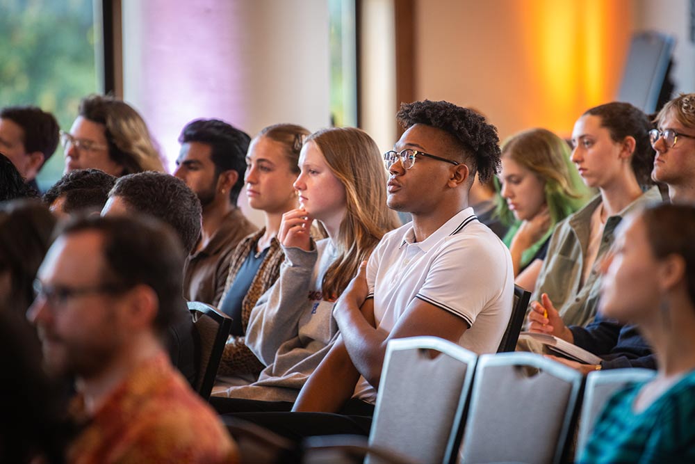 Students listening to physicist Chanda Prescod-Weinstein presenting Clark’s annual Presidential Lecture.