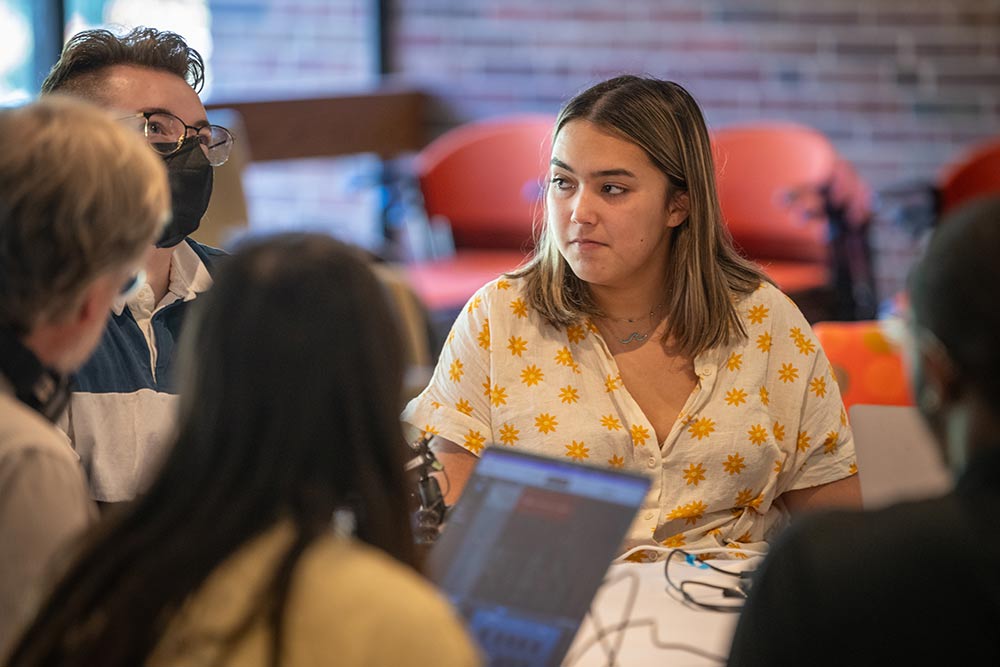 Students listening to physicist Chanda Prescod-Weinstein during a small discussion.
