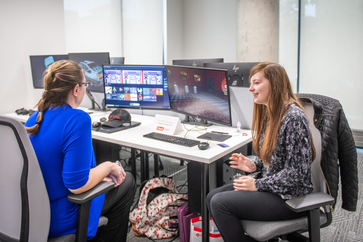 two people at computer