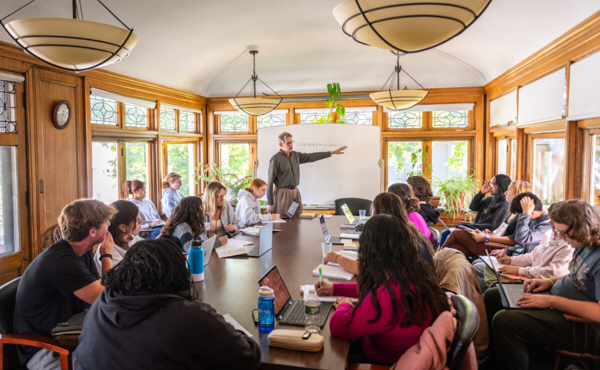 Professor Wes Demarco teaches in classroom.