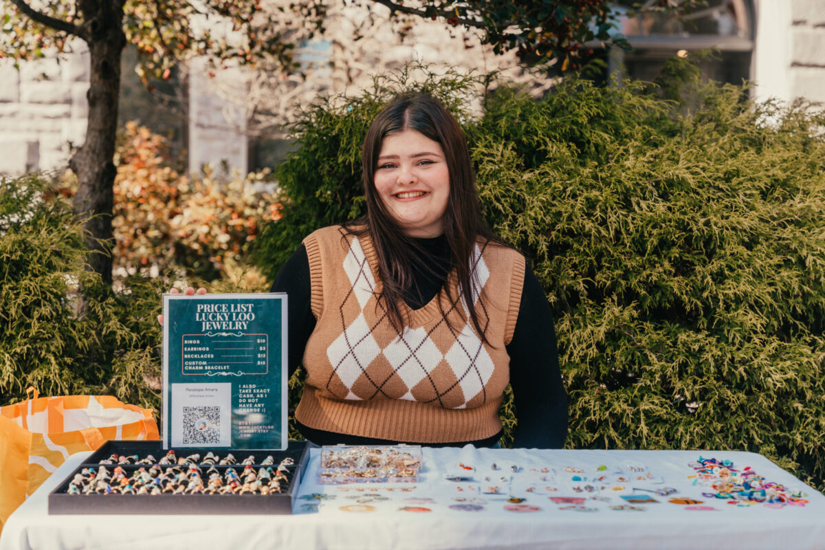 student sells rings at table