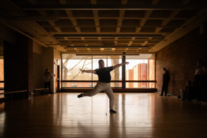 dancer in front of window