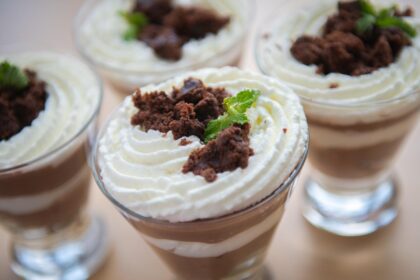 dessert cups with mousse and whipped cream