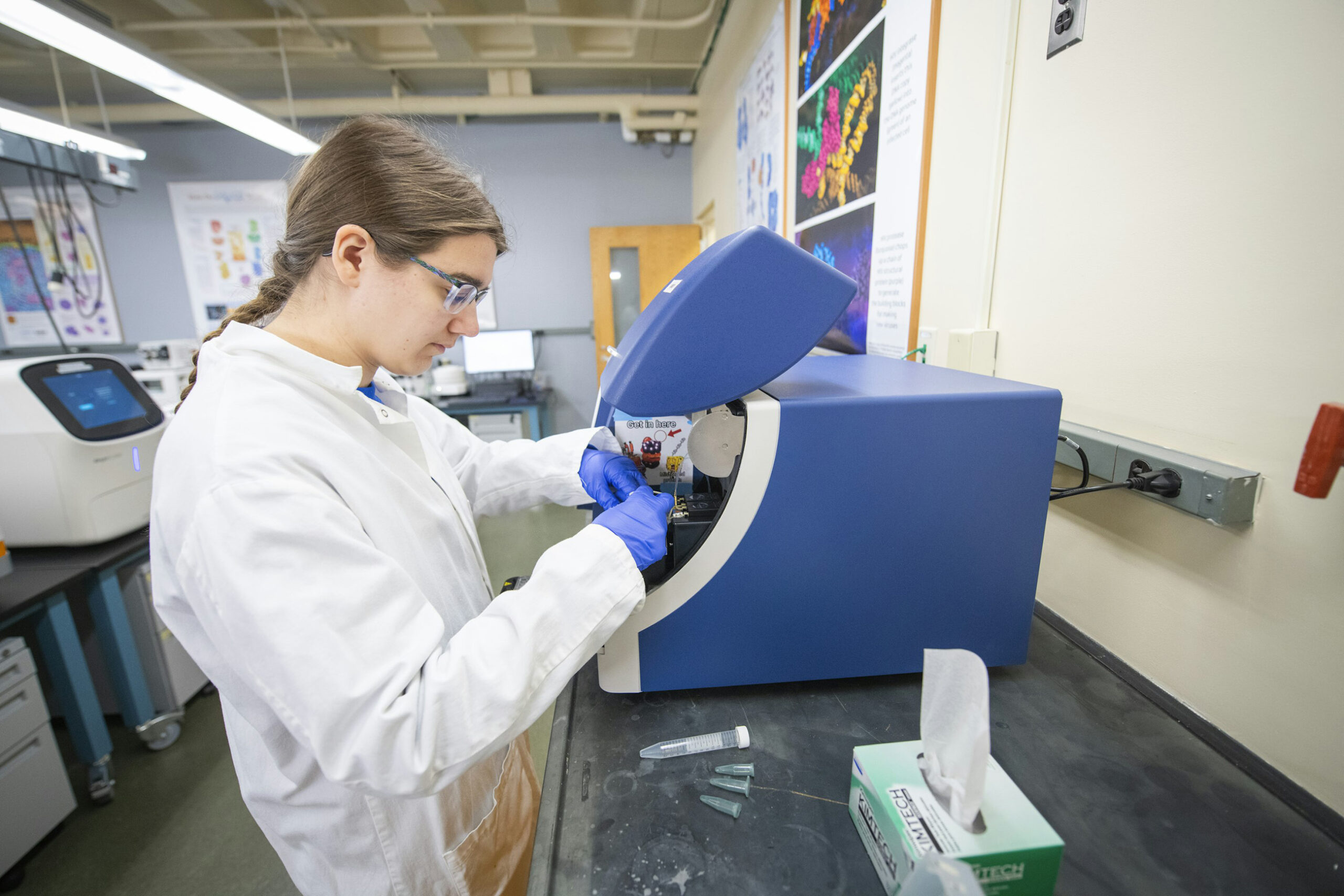 Ph.D. student Emily Schaffter uses equipment in the new lab