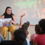 student teacher in classroom with elementary schoolers
