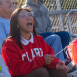 person cheering during game