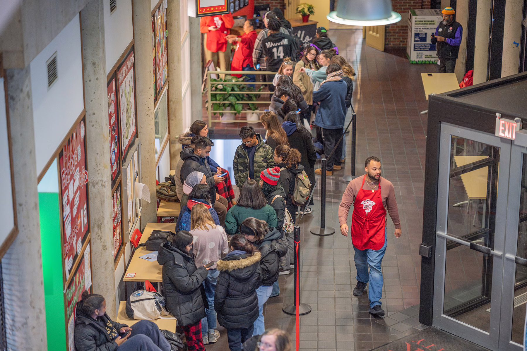 A long line of students waiting to enter Late Night Breakfast, fall 2025; photo by Natalie Hoang ’25, MBA ’26