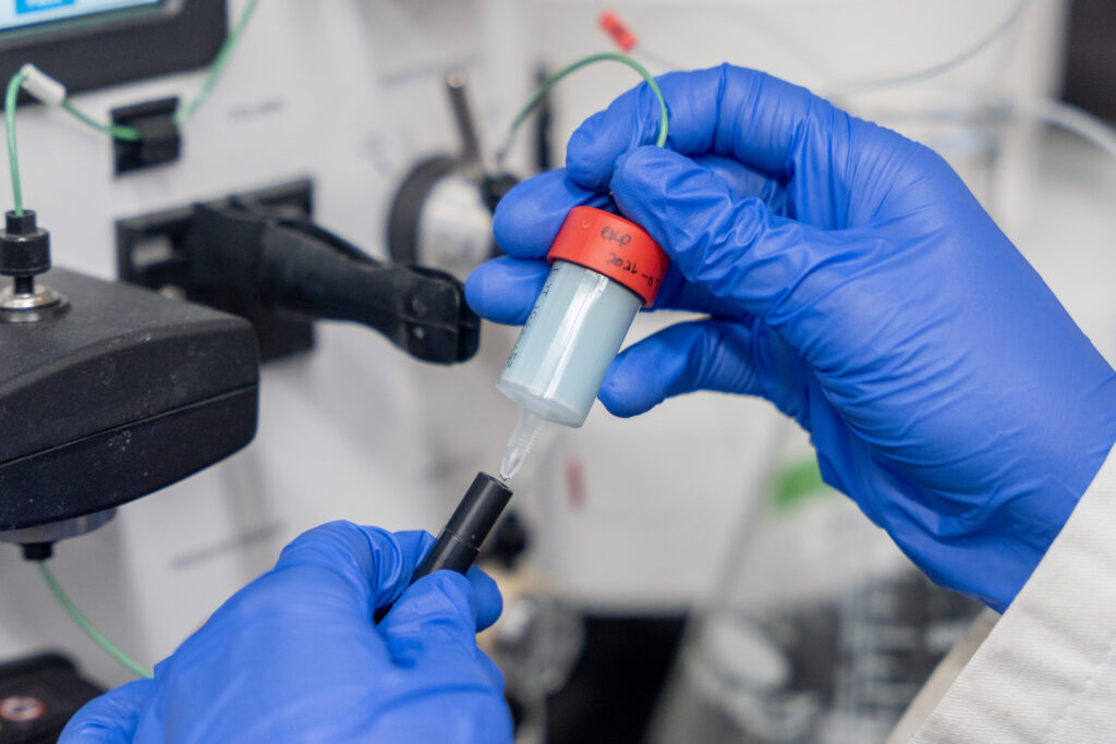 student works in science lab